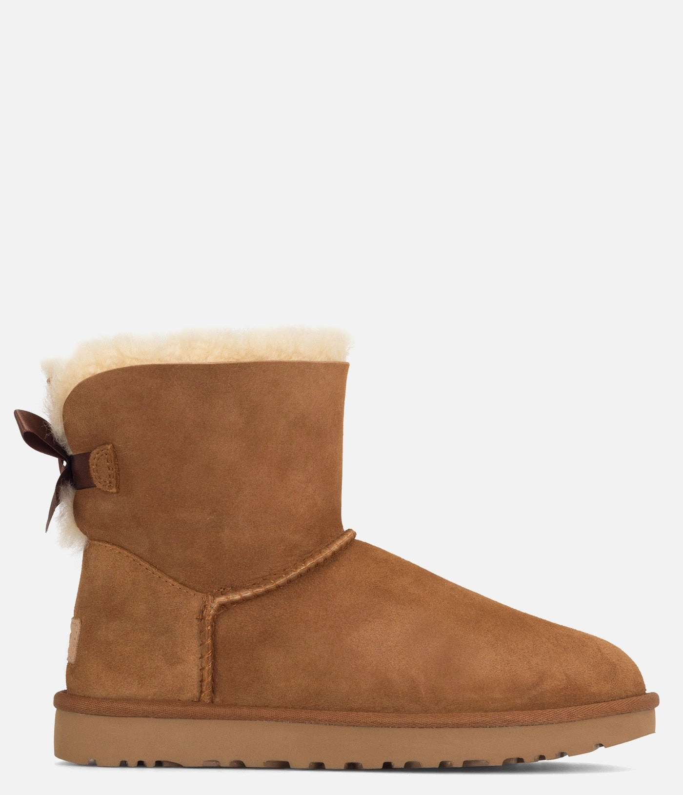 UGG Mini Bailey Bow II Sheepskin Boot - Women Golf Functional Piece